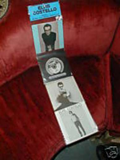 RARE ELVIS COSTELLO  45 7" 4 PACK SINGLE W/ PL CASE NM